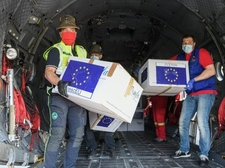 Boxes of protective masks are unloaded from a military airplane coming from Bucharest, Romania to Milan, Italy as part of the Operation RescEU in the context of the COVID-19 pandemic.